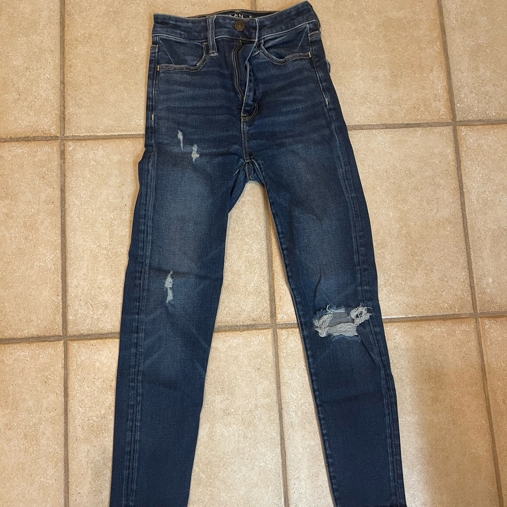 Ripped dark wash skinny jeans